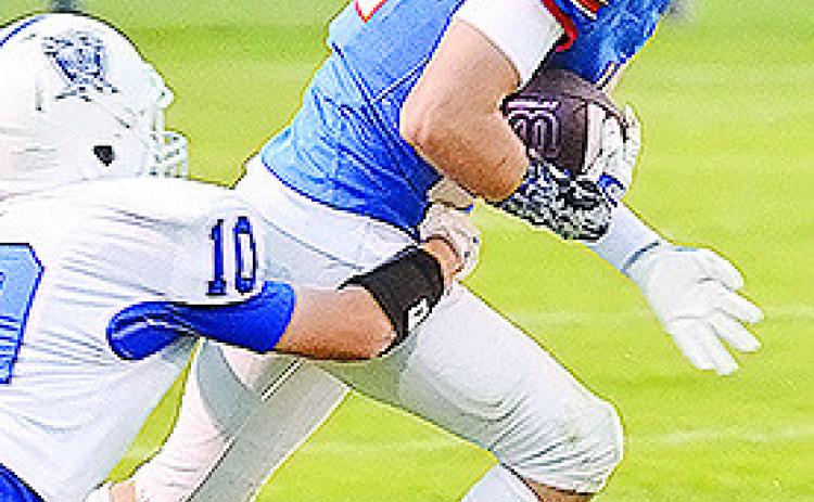 BF-DC’s Ezra Denny shakes off a tackler during the Eagles’ game against Cyril Friday at home. CDN | Sam Goodwyn