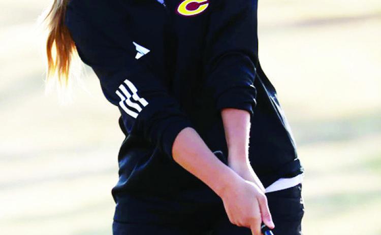 Clinton’s Grace Meacham stares at her putt during a tournament this spring. CDN |Courtesy Photo