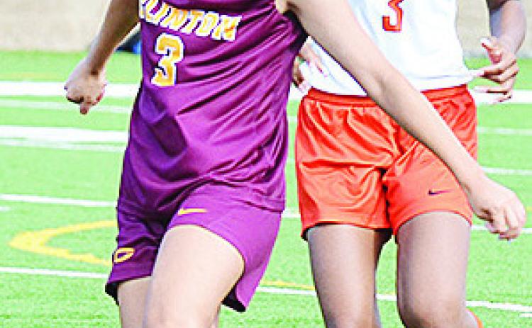 No. 3 Alyson Lopez beats a Douglass player to the ball during Clinton’s home game Tuesday against the Lady Trojans. CDN | Sam Goodwyn