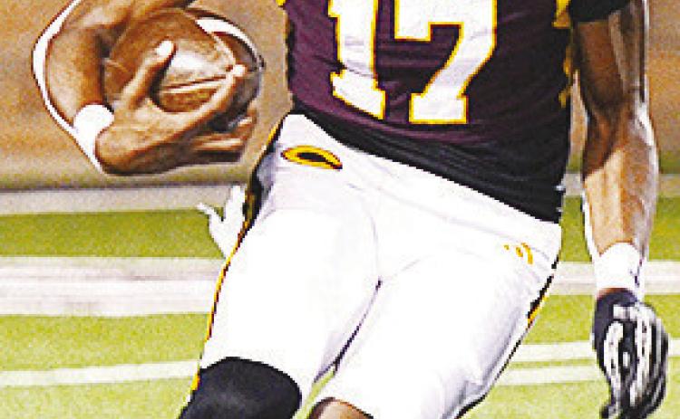 Clinton’s DJ Lister turns upfield after catching the punt during the Red Tornadoes’ game against Elgin in the Tornado Bowl. CDN | Micah Ashcraft