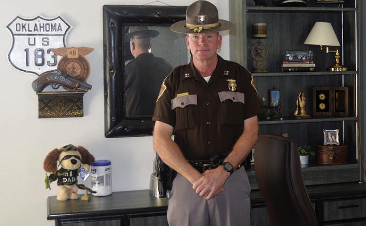 Capt. Chance Husted shows off his new office during the ribbon cutting ceremony Tuesday at the Oklahoma Highway Patrol Troop H Headquarters. CDN | Christian Jacobsen