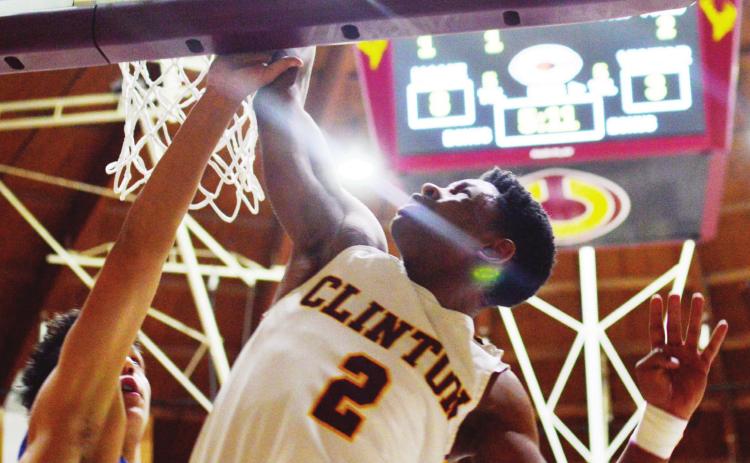 Clinton claims district crowns