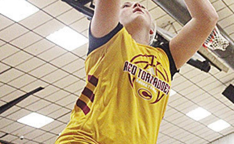 Clinton’s Rhylee Rodebush goes up for the layup during a basketball camp in Broken Bow. CDN | Courtesy photo