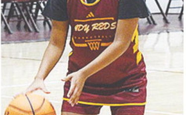 Clinton’s AJ Spottedwolf practices her free throws during a recent Lady Reds’ basketball practice in the Tornado Dome. CDN |Sam Goodwyn