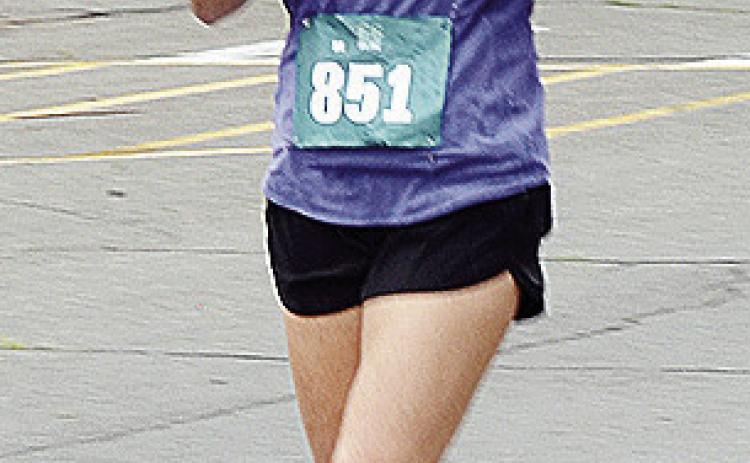 Clinton’s own Stephanie Bridgeman heads toward the finish line during the Clinton Classic Run Saturday on Frisco Avenue. CDN | Sam Goodwyn