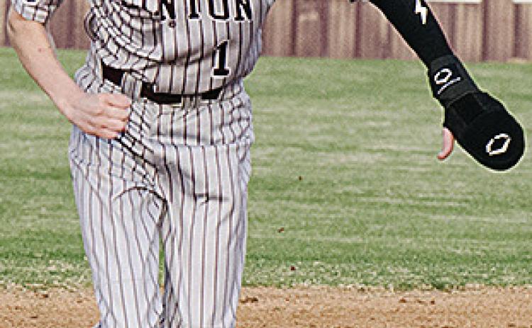 No. 1 Jeter King speeds toward third during Clinton’s win over Western Heights Tuesday at home. CDN | Sam Goodwyn