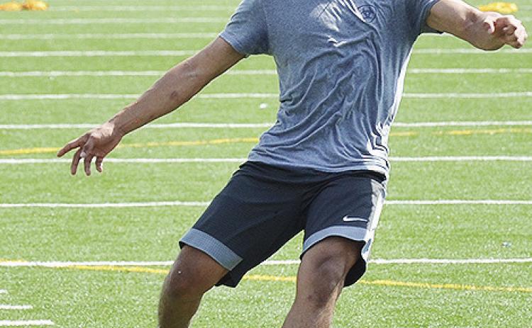 Clinton’s Luis Rodriguez works on his field goal kicks during practice in the Tornado Bowl. CDN | Sam Goodwyn