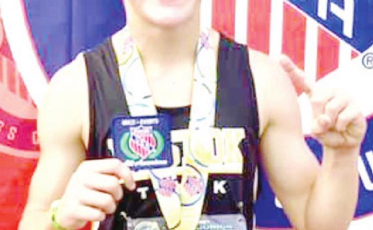 Adams earns Junior Olympic