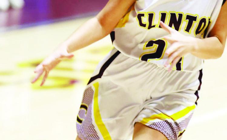 Clinton’s Sydnee Pugh dribbles the ball up the court during an seventh-grade girls’ home game in the Tornado Dome. CDN | Courtesy Photo