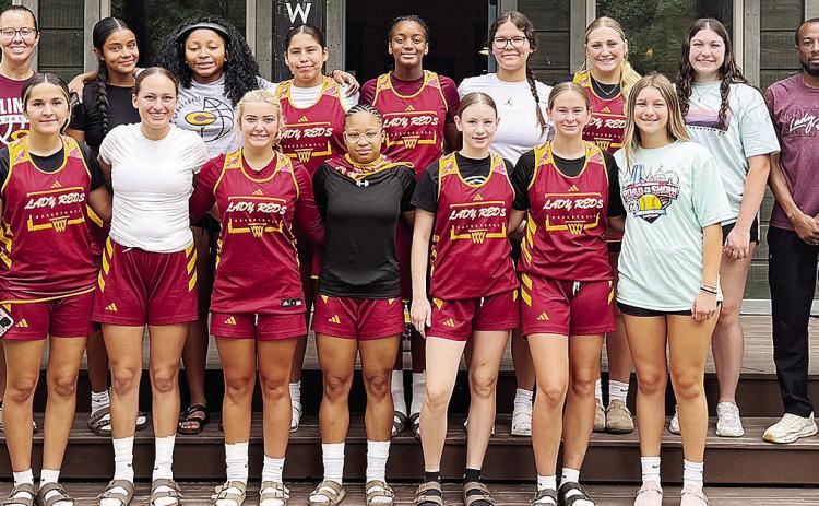 The Clinton Lady Reds basketball team comes together while in Broken Bow for a summer camp. Pictured in front, from left, are Emily De La Rosa, Paisley Ruyle, Laney Anderson, Ale-Jia Lacey, Hannah Miller, Sydney Pugh and Hadley Meget; back, Coach Ashley Griffith, Tina Rodriguez, Arlena Kirkendoll, Jaeda Blackeagle, Tariah Elix, Arianna Spottedwolf-Pratt, Rhylee Rodebush, Brook Aston and Coach Two Jefferson. CDN | Courtesy photo