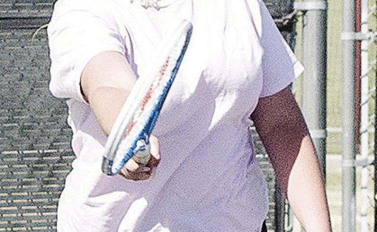 Clinton’s Vanessa Schmitz hits the tennis ball during tennis practice at the high school courts. CDN | Sam Goodwyn
