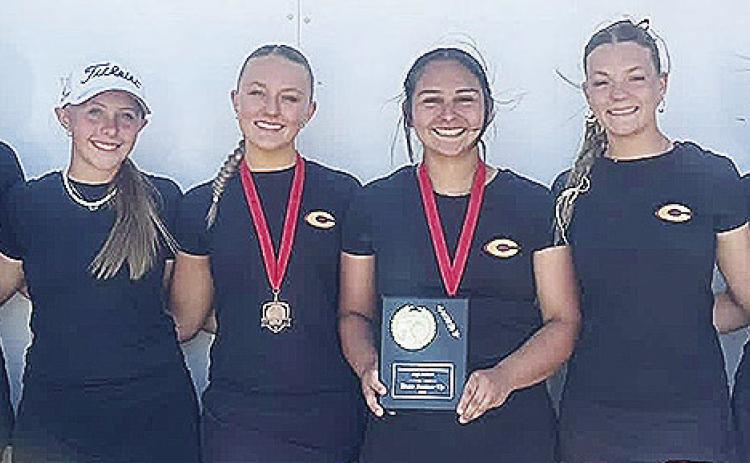 The Clinton Lady Reds golf team is all smiles after finishing second at the Weatherford Golf Tournament at Prairie West Golf Club Thursday. Pictured, from left, is Coach Tasha Marshall, Quinn Moore, Paige Pugh, Emma Ray, Jocelyn King, Tatum Fanshier, Stel