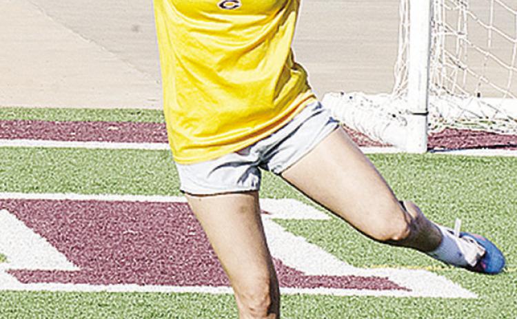 Clinton’s Sammy Meraz goes to kick the ball during soccer practice at the Tornado Bowl. CDN | Sam Goodwyn