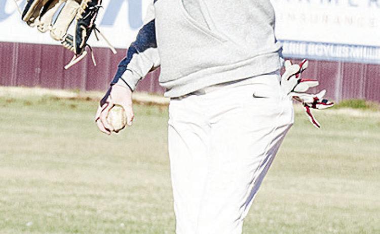 Jeter King throws the ball back to the mound after fielding it during Thursday’s practice. CDN | Sam Goodwyn