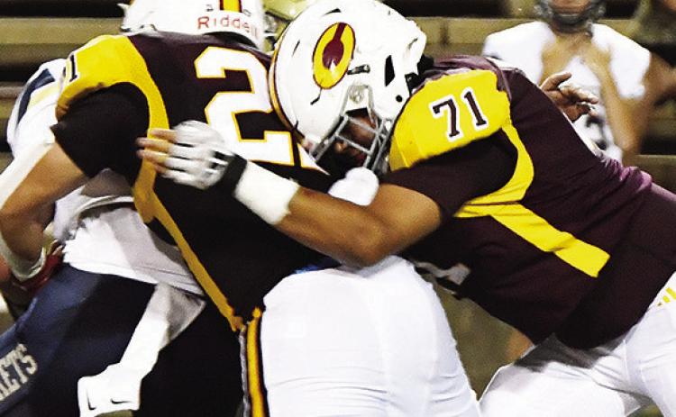 Senior Clinton football player eyes future in oil
