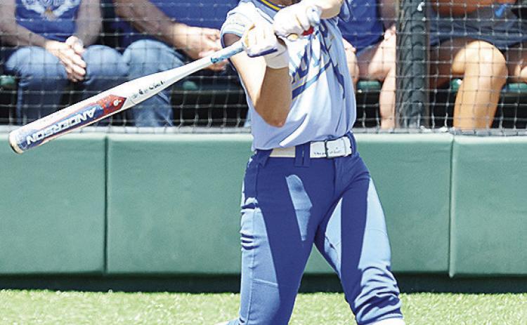 Arapaho-Butler’s Reagan Schoeppach stares down the ball as she prepares to hit it during the Lady Indians’ Class 3A State Softball Tournament game Monday against Dewar. CDN | Sam Goodwyn