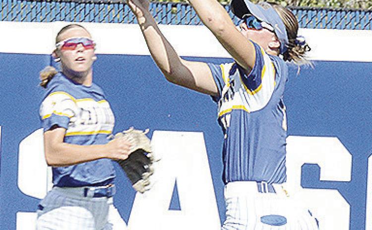 A-B’s Peyton Lambeth, right, makes a running catch for the out while Dalaynie Lee backs her up during the Lady Indians’ state championship win over Caddo Saturday at Devon Park. CDN | Sam Goodwyn