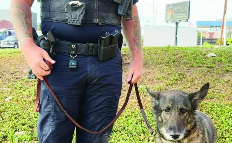Sgt. Dillon Mach and K9 Mama Bear