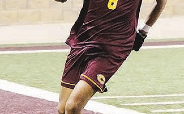 Senior enjoys playing soccer with teammates