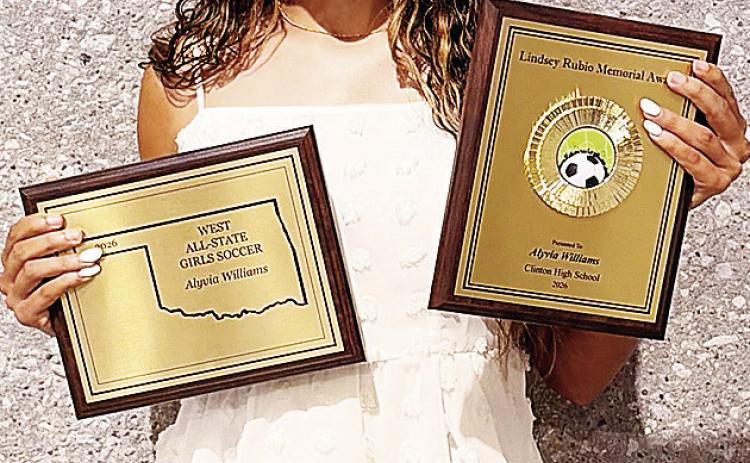 Clinton’s Alyvia Williams shows off her All-State and Rubio MVP Awards during the end-of-year soccer banquet last week in the Frisco Center. CDN | Courtesy photo