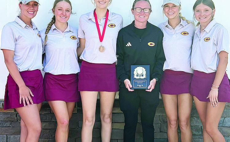 The Clinton Lady Reds are all smiles as they finish second at the Weatherford Golf Tournament Thursday at the Praire West Golf Course in Weatherford. Pictured, from left, are Grace Meacham, Jocelyn King, Addyson Littke, Coach Tasha Marshall, Addison Newco