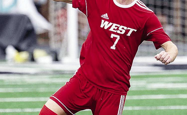 Corn Bible Academy’s Jaden Zeller keeps his eye on the ball as he goes after it during the All-State Soccer game at Taft Stadium in Oklahoma City. CDN | Courtesy photo