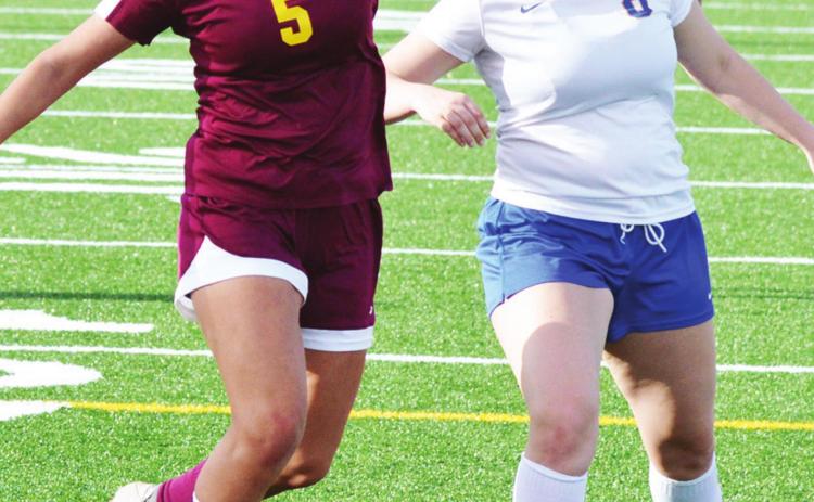Thompson plays team-first role for Lady Reds
