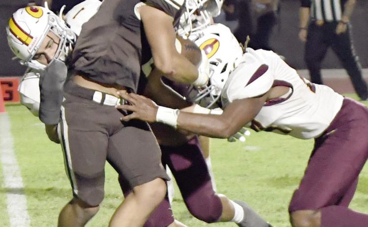 Reds drop district showdown