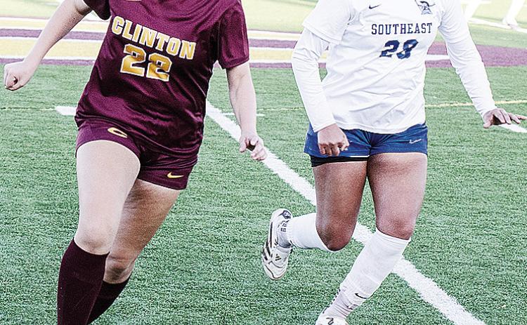 Clinton’s Aaliyah Lopez outruns a Southeast defender as she takes the ball downfield toward the goal during the Lady Reds’ win Thursday over the Lady Spartans at home. CDN | Sam Goodwyn
