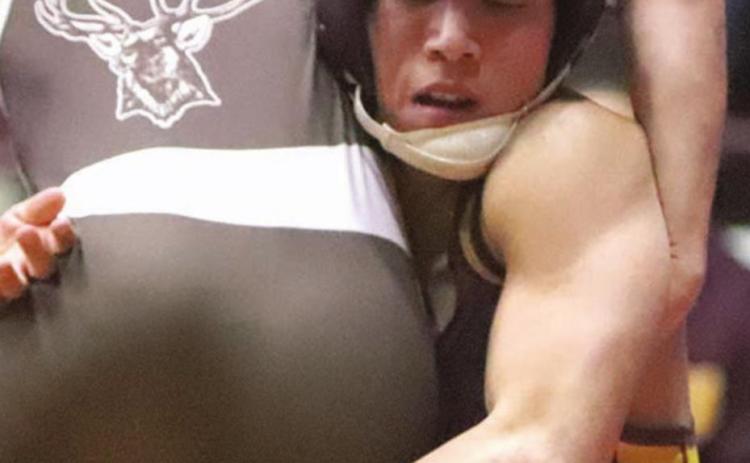 Clinton Red Tornadoes go 1-2 at district duals