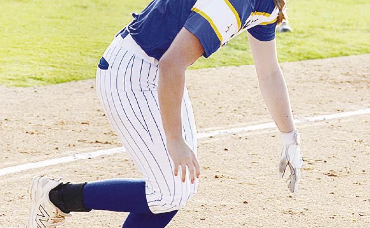 A-B’s Kelsey Garibay throws her bat down as she hustles out of the batter’s box after hitting the ball Monday against the Hydro-Eakly Lady Bobcats. CDN | Sam Goodwyn