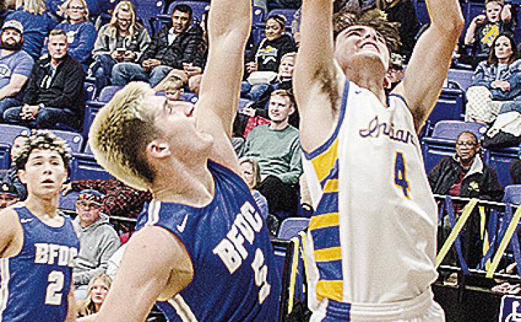 A-B’s Kaden Waldrop goes up for the layup while a BF-DC defender guards him Friday during the Indians’ home game. CDN | Sam Goodwyn