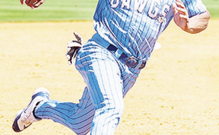 SWOSU’s Gage Gaunt rounds third in the Bulldogs’ game against East Central University. CDN | Courtesy photo