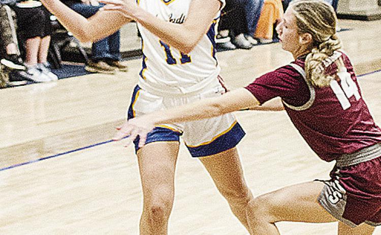 A-B’s Alivia Casas looks for an open teammate during the first round of the Western Equipment Classic against Sayre. CDN | Sam Goodwyn