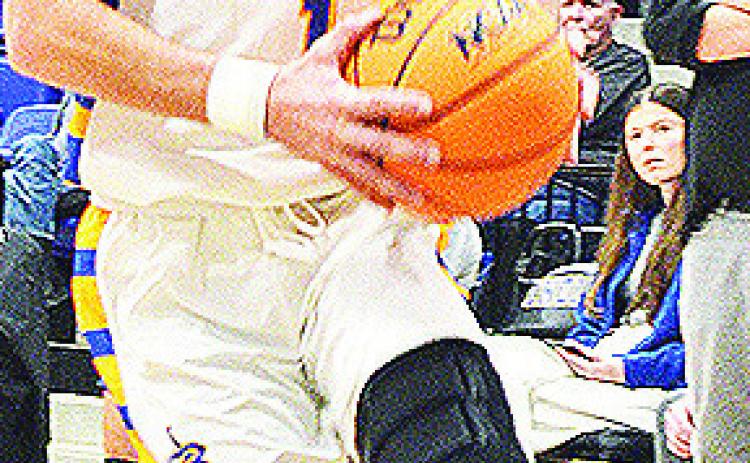 No. 1 Rylan Moore drives toward the basket during A-B’s home game against Fort Cobb. CDN | Sam Goodwyn