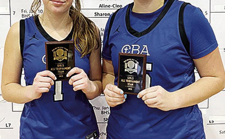After finishing runner-up to Hillsdale Christian Academy in the Burlington New Year’s Invitational Basketball Tournament, Corn Bible Academy’s Alli Slagell, left, and Kate Stewart were named to the All-Tournament team. CDN | Courtesy photo