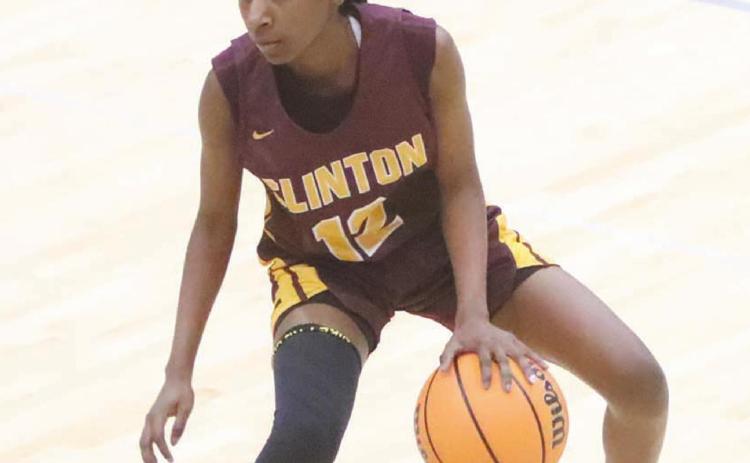 Jefferson joins 1,000-point club, Lady Reds take consolation crown