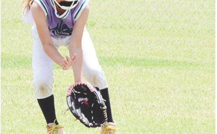 Morrison’s Adalynn Cotton charges at the ground ball during the Magic’s game against the Mooreland Wildcats Thursday in the OK Kids 8U State Softball Tournament at Schumacher Fields at Acme Brick Park. CDN | Sam Goodwyn
