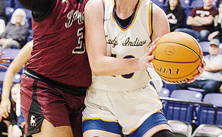 No. 10 Kelsey Garibay drives through a Pioneer-Pleasant Vale defender, as she heads toward the basket in A-B’s win over the Lady Mustangs Saturday to clinch the district championship. CDN | Sam Goodwyn