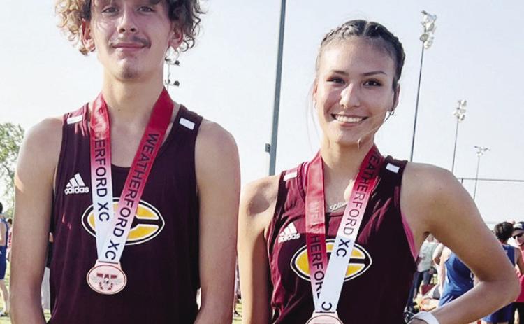 Two Red Tornado runners race to state