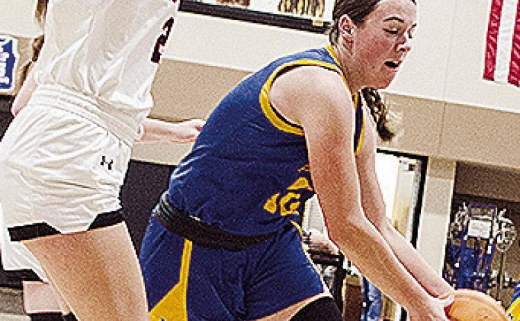 Arapaho-Butler’s Kelsey Garibay drives by a Cheyenne-Reydon defender during the girls’ championship game Saturday of the Western Equipment Classic. CDN | Sam Goodwyn