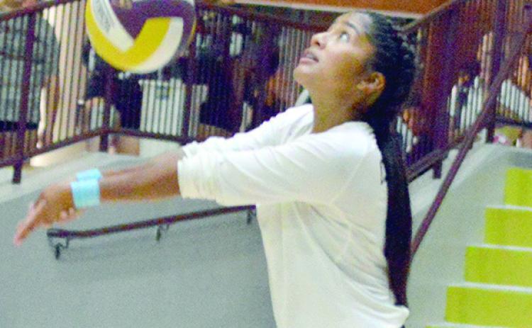 Lady Reds get swept by Tuttle