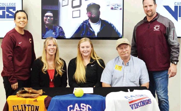 Whitney signs at Carl Albert State