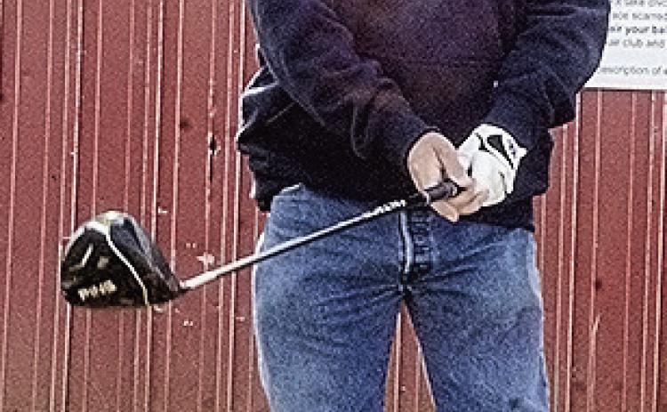 Ray Martin aims where he wants to send the ball before he tees off Thursday at Riverside Golf Course. CDN | Sam Goodwyn