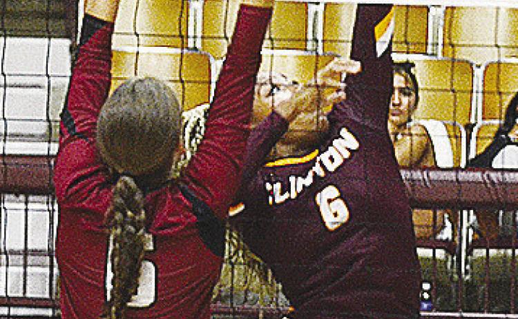 Clinton’s Arlena Kirkendoll hits the ball back over the net during the Lady Reds’ match against Weatherford Tuesday in the Dome. CDN | Sam Goodwyn