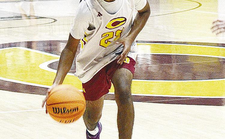 Joseph Nava dribbles the ball up the court during the Clinton boys’ JV game against Elk City Tuesday at the Tornado Dome.