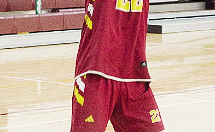 Clinton’s Davien Stanley plants his foot as he attempts to the shoot the ball during basketball practice. CDN | Sam Goodwyn