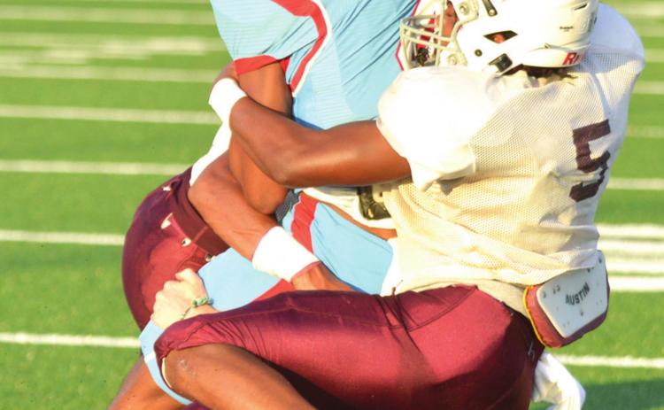 Fight cuts Clinton’s scrimmage short