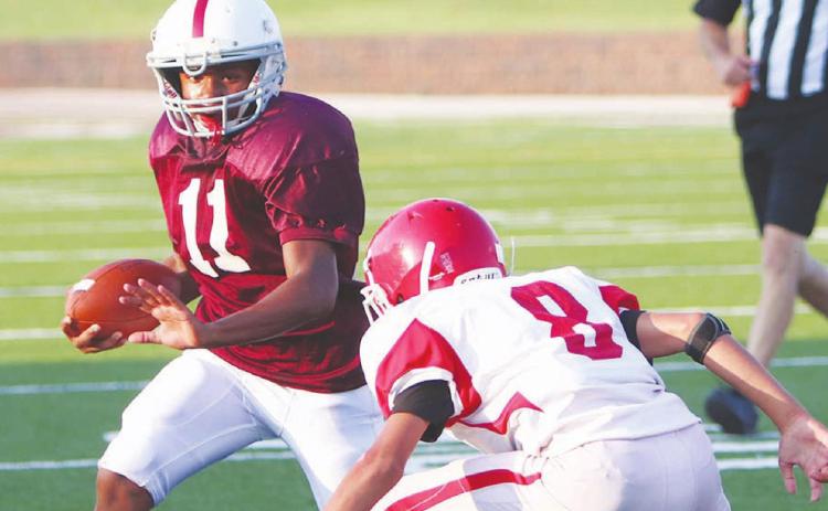 CMS football stumbles in opener