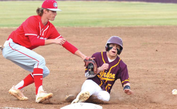 Late miscues cost Reds in opener